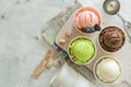 Selection of colorful ice cream scoops in paper cones Royalty Free Stock Photo