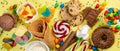 Selection of colorful sweets - chocolate, donuts, cookies, lollipops, ice cream
