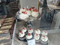 A selection of delicious cakes through a bakery window Royalty Free Stock Photo