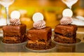 Selection of desserts: amandine, meringue with chocolate and strawberries, caramel cake