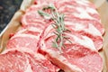 Selection of different cuts of fresh raw red meat in a supermarket Royalty Free Stock Photo