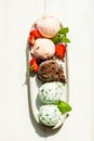 Selection of different ice cream scoops such as mint, chocolate and strawberry Royalty Free Stock Photo