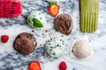 Selection of different ice cream scoops such as mint, chocolate and strawberry Royalty Free Stock Photo