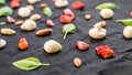 Selection of different Italian food ingredients against black background Royalty Free Stock Photo