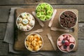 Selection of different rolled ice creams in cone cups Royalty Free Stock Photo