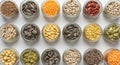 A selection of different seeds and grains arranged in small glass jars in a grid pattern. Royalty Free Stock Photo