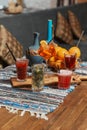 selection of drinks cocktails colourful on table with blurred background bar restaurant mixing bartender alcohol.