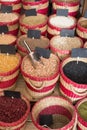 Selection of dry beans packed in baskets on bazar