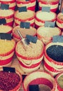 Selection of dry beans packed in baskets on bazar