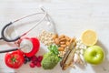 Selection food good for heart with stethoscope, healthy diet concept Royalty Free Stock Photo