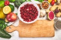 Selection food of rich in antioxidants and vitamins and mineral sources, on white wooden background around cutting board. Healthy Royalty Free Stock Photo