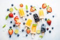 selection of fruit popsicles on ice with fresh fruit Royalty Free Stock Photo
