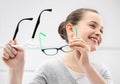 Selection of glasses, a little girl with an ophthalmologist