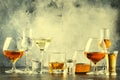 Selection of hard strong alcoholic drinks in big glasses and small shot glass in assortent: vodka, cognac, tequila, brandy and Royalty Free Stock Photo