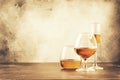 Selection of hard strong alcoholic drinks and spirits in assortment: cognac, brandy and rum. Gray bar counter background, Royalty Free Stock Photo