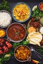 Selection Of Indian dishes in traditional serving kadai dishes