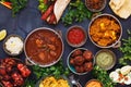 Selection of Indian food with various bowls of food