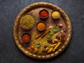 Selection Indian spices, spicy, herbs and seasonings on a metal tray,