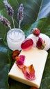 Spa treatment preparation with rose petals and lavender cream