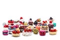 Selection of miniature cakes, macrons, cupcakes and treats