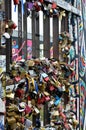 Selection of pad locks hanging on a gat Royalty Free Stock Photo