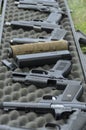 Selection of pistol firearms at the target practice range