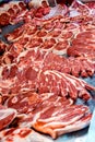 Selection of quality meat in a butcher shop. Different types of fresh meat are on display. Meat assortment Royalty Free Stock Photo