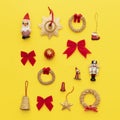 Selection of retro christmas ornaments isolated on bright yellow background. Royalty Free Stock Photo