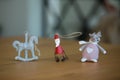 Christmas tree ornaments sitting on a wooden table