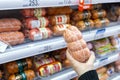 Selection of sausages in a store in the gastronomic department Royalty Free Stock Photo
