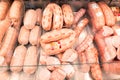 Selection of sausages in a store in the gastronomic department of semi-finished products. Royalty Free Stock Photo