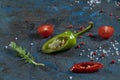 Selection of spices herbs and greens. Ingredients for cooking. Food background on black slate table. Royalty Free Stock Photo