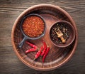 Selection of spices pepper. Food background on black wood table. Royalty Free Stock Photo