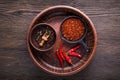 Selection of spices pepper. Food background on black wood table. Royalty Free Stock Photo