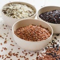 Selection of variety of gourmet rice in bowls. Selective focus Royalty Free Stock Photo