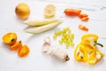 Selection of various fresh yellow raw organic produce fruits and vegetables. Royalty Free Stock Photo