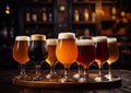 Selection of various glasses with craft beer on pub table with various bottles background.Macro.AI Generative Royalty Free Stock Photo