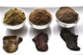 A selection of various natural henna & x28;Lawsonia inermis& x29; hair color dyes wet mixture on white