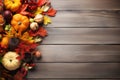 Selection of various pumpkins on wooden table background. Autumn vegetables and seasonal decorations Royalty Free Stock Photo