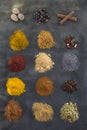 Selection of various spice on slate background Royalty Free Stock Photo