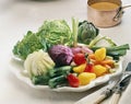 Selection of vegetables and small copper saucepan