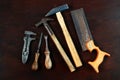 A selection of wooden handled vintage tools..