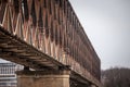 Selective blur on an abandoned steel bridge, stari zeleznicki most, or old railway bridge, in Belgrade, Serbia, with rusted beams. Royalty Free Stock Photo