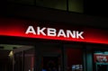 Selective blur on a Akbank logo on an office in Istanbul at night.