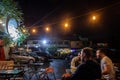Selective blur on Blurry young serbian men sitting at the terrace of a cafe and bar of Cetinjska