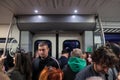 Selective blur on a crowd of people, standing during rush hour in a Serbian train from belgrade to Novi Sad, packed and full Royalty Free Stock Photo