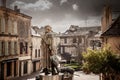 Selective blur on the Cyrano de Bergerac statue, in bronze on Place Pelissiere square. Royalty Free Stock Photo