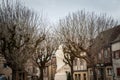 Selective blur on the Cyrano de Bergerac statue, in stone, on Place de la Mirpe square. Royalty Free Stock Photo