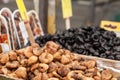 Selective blur on dried figs for sale for sale on a market in Belgrade, Serbia piled on a stall in a pijaca. Royalty Free Stock Photo