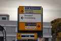 Selective blur on a german roadsign in Wuppertal, Germany, indicating directions to autobahn motorway to Dortmund & Dusseldorf &